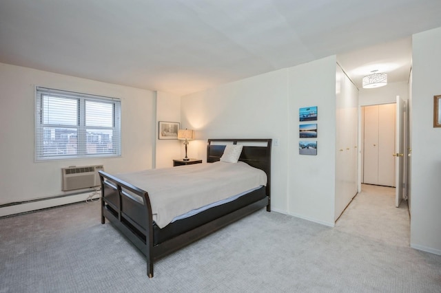 carpeted bedroom featuring a wall unit AC and baseboard heating