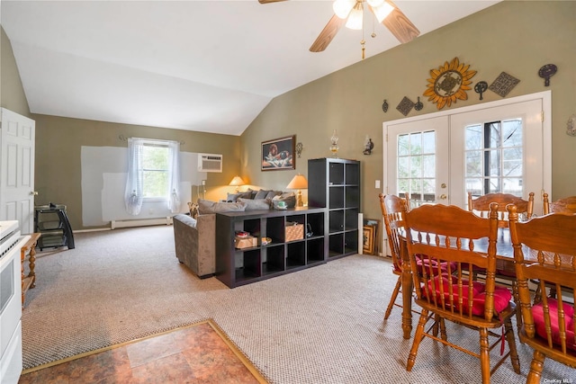 dining area with vaulted ceiling, french doors, baseboard heating, and carpet