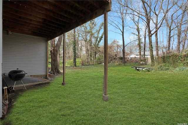 view of yard with fence