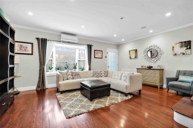 living room with baseboards, crown molding, a wall unit AC, and hardwood / wood-style floors