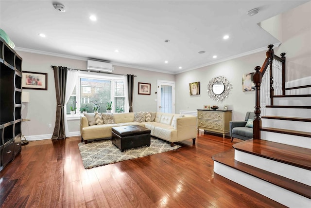 living room featuring hardwood / wood-style flooring, stairway, baseboards, and a wall mounted air conditioner