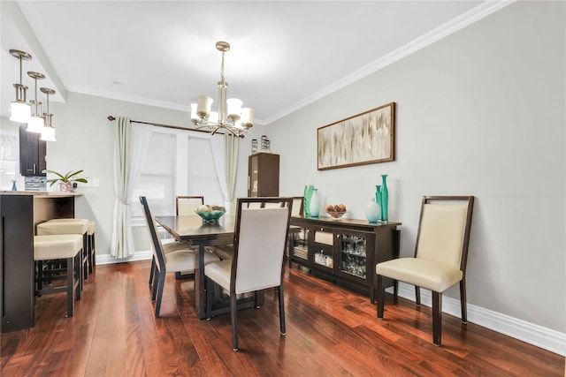 dining area featuring ornamental molding, baseboards, an inviting chandelier, and dark wood-style flooring