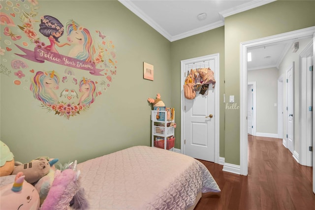 bedroom with dark wood-type flooring, baseboards, and ornamental molding