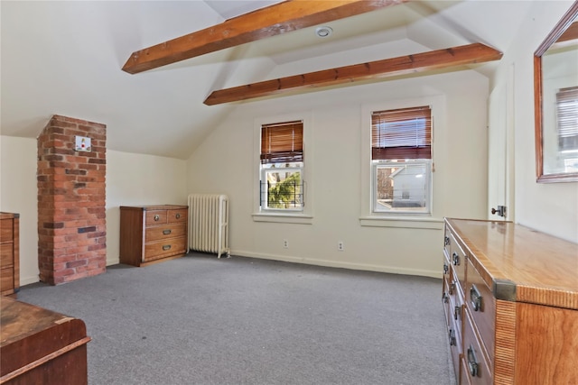 additional living space with baseboards, carpet floors, vaulted ceiling with beams, and radiator heating unit