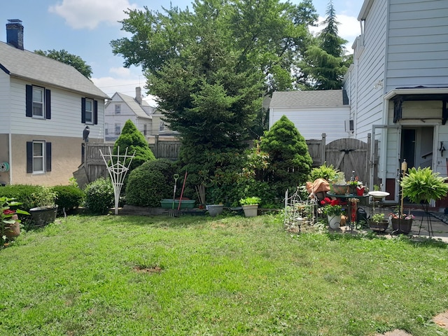 view of yard with a gate and fence