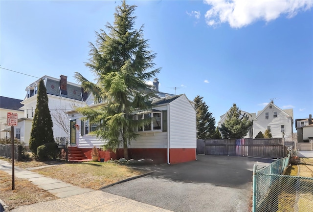 exterior space featuring crawl space and fence