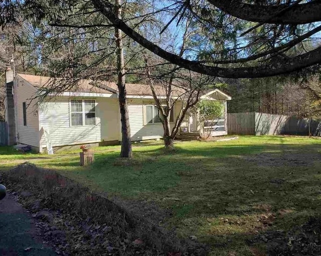 view of yard featuring fence