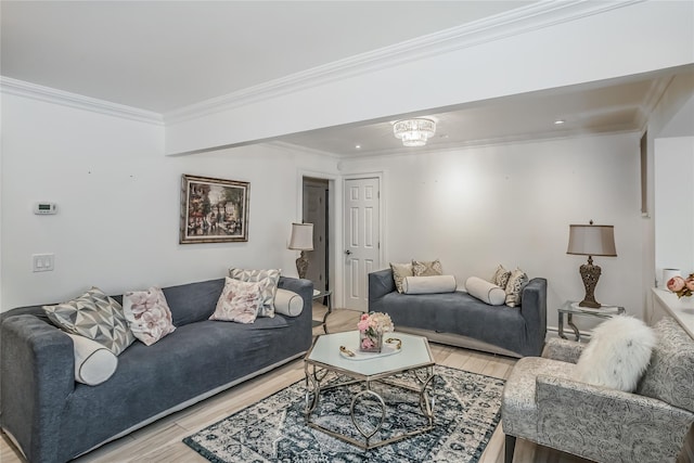 living room with light wood-style floors and ornamental molding