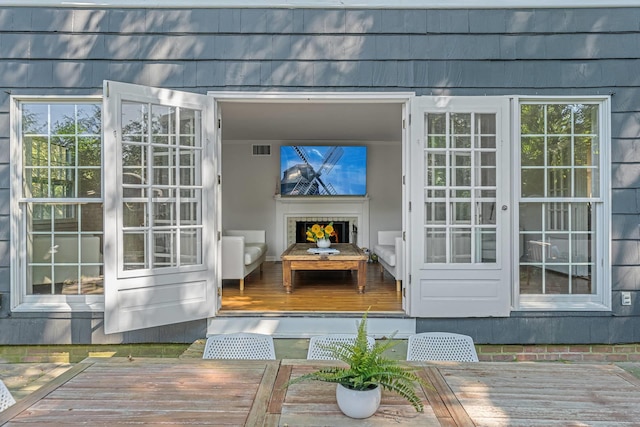 27 Notamiset Rd, Westhampton Beach, NY 11978 - exterior space with visible vents and outdoor dining space