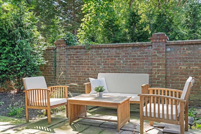 27 Notamiset Rd, Westhampton Beach, NY 11978 - view of patio featuring an outdoor hangout area