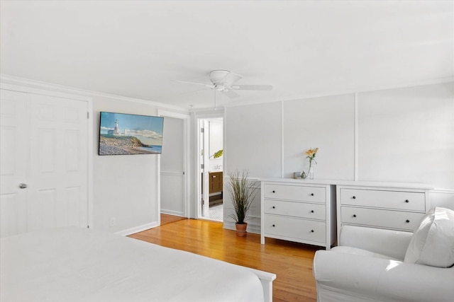 27 Notamiset Rd, Westhampton Beach, NY 11978 - bedroom with ceiling fan, light wood-style flooring, and crown molding