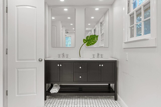 27 Notamiset Rd, Westhampton Beach, NY 11978 - bathroom with double vanity, baseboards, a sink, and recessed lighting