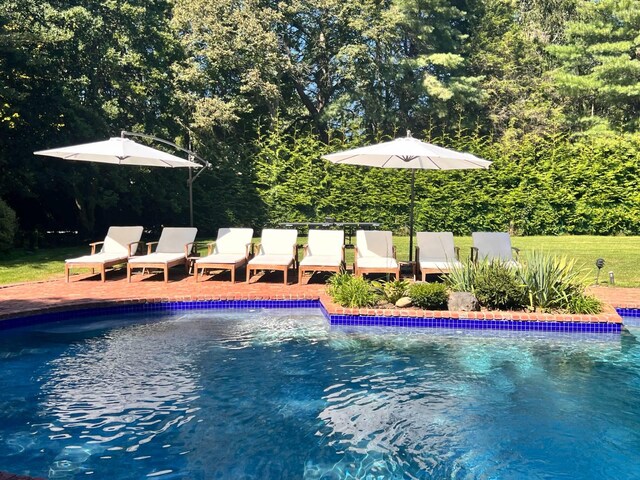 27 Notamiset Rd, Westhampton Beach, NY 11978 - outdoor pool featuring a patio area