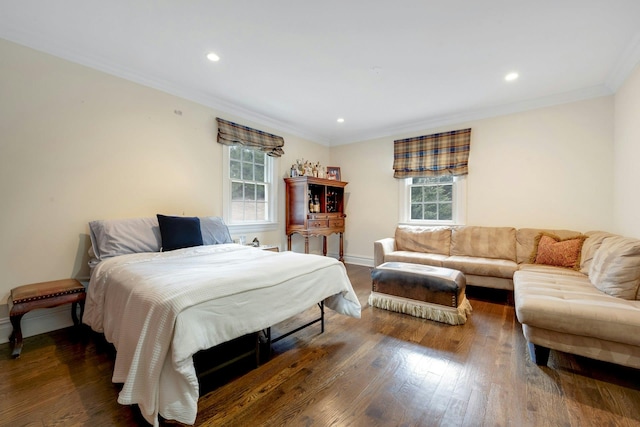 bedroom featuring ornamental molding, recessed lighting, wood finished floors, and baseboards