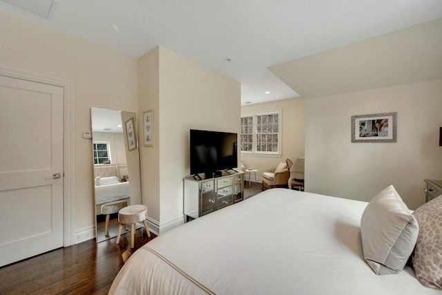 bedroom featuring recessed lighting, dark wood finished floors, visible vents, and baseboards