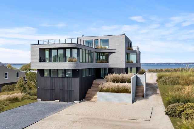 contemporary house featuring a balcony