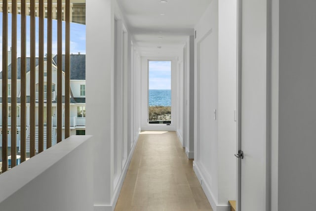 hallway featuring a water view