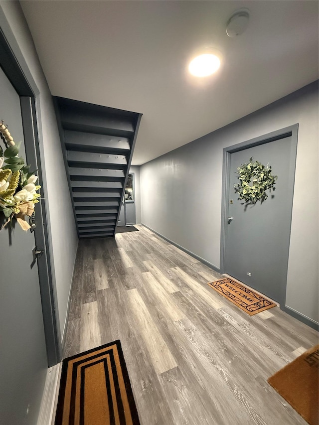 hallway featuring wood finished floors