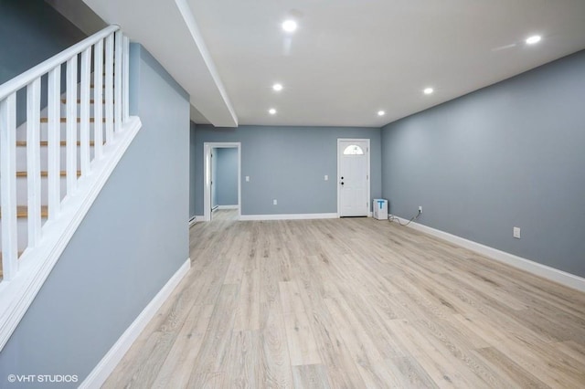 interior space with recessed lighting, stairway, baseboards, and wood finished floors