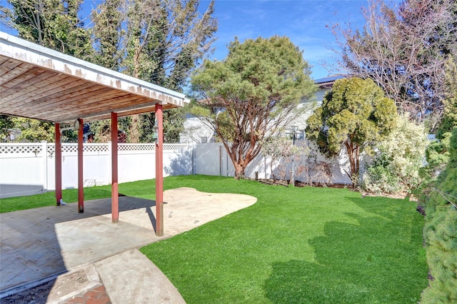 view of yard featuring a patio area and fence