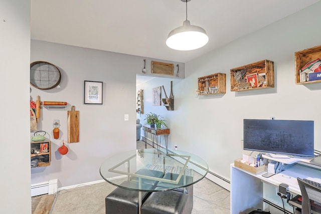 carpeted office space featuring baseboards and baseboard heating