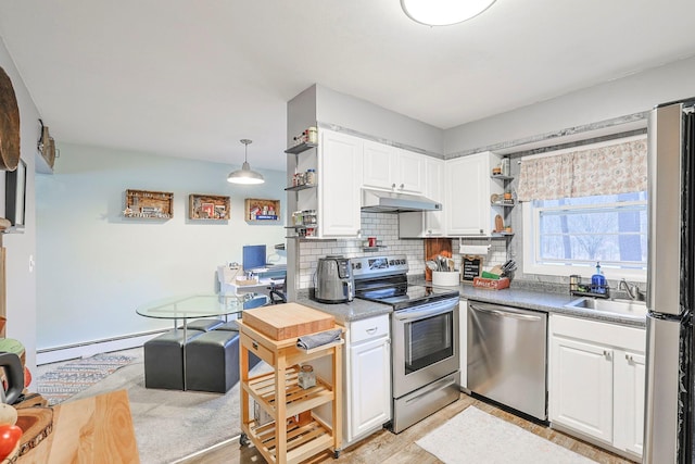 kitchen featuring stainless steel appliances, under cabinet range hood, white cabinetry, open shelves, and a sink