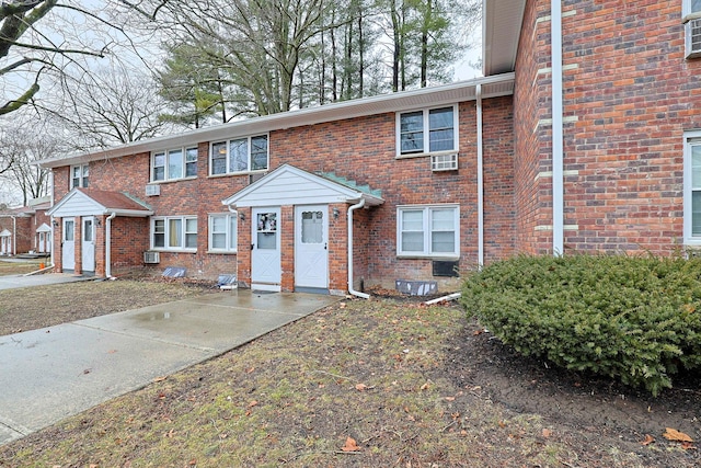 multi unit property featuring brick siding