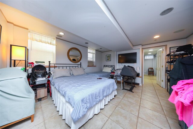 bedroom with light tile patterned flooring and recessed lighting