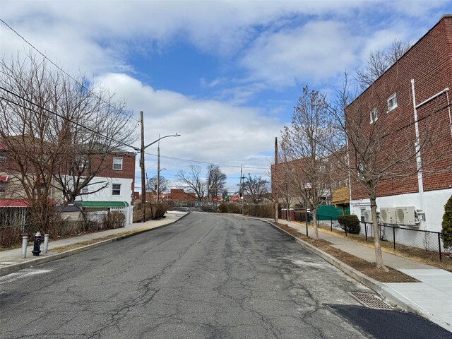 3645 Fenton Ave, Bronx, NY 10469 - view of street featuring curbs, street lighting, and sidewalks