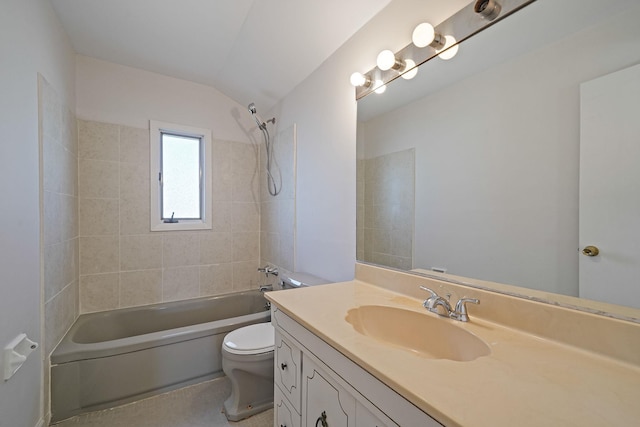 bathroom with toilet, vaulted ceiling, tub / shower combination, and vanity