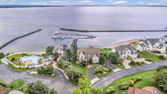 aerial view featuring a water view and a residential view