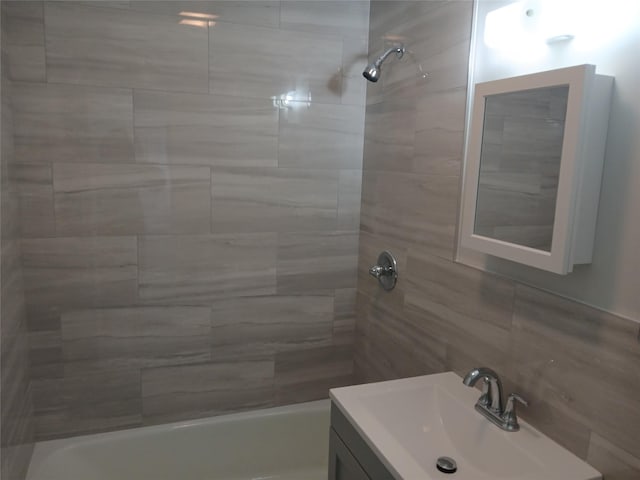 full bath featuring shower / bathing tub combination and vanity