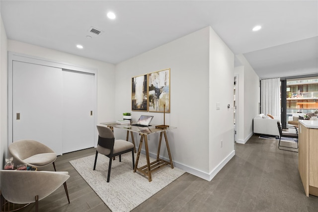 office with recessed lighting, visible vents, baseboards, and wood finished floors