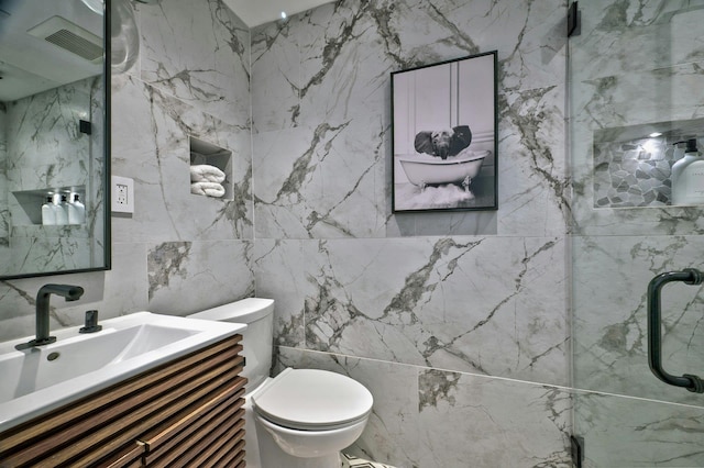 full bath featuring toilet, visible vents, a shower, and vanity