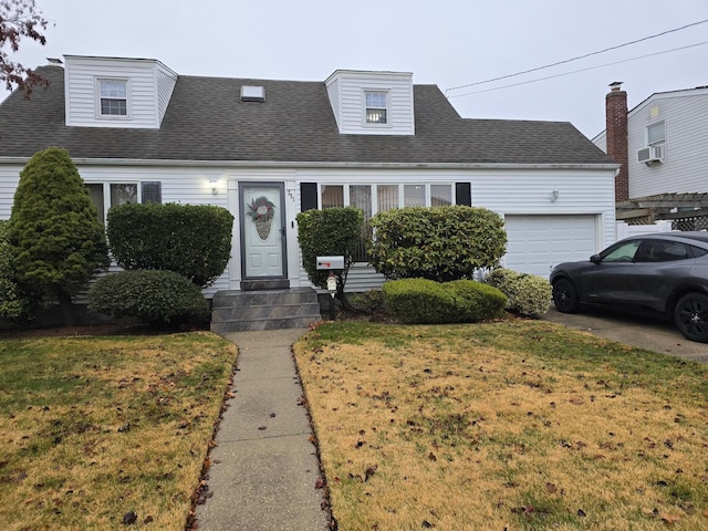 new england style home featuring a garage, a front lawn, roof with shingles, and cooling unit