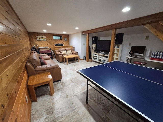 rec room featuring recessed lighting and wooden walls