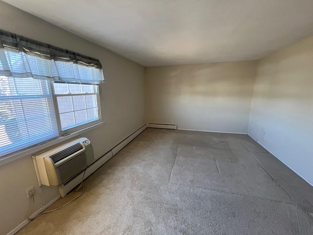 empty room with carpet flooring and an AC wall unit