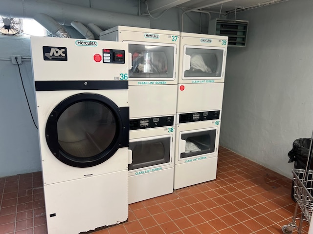 shared laundry area featuring stacked washer and dryer and separate washer and dryer