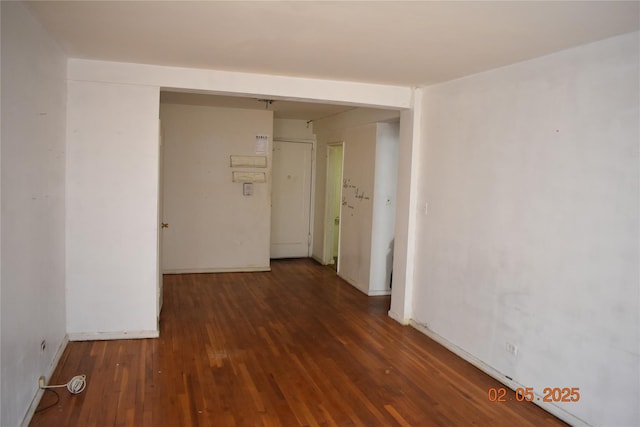 hallway with wood finished floors