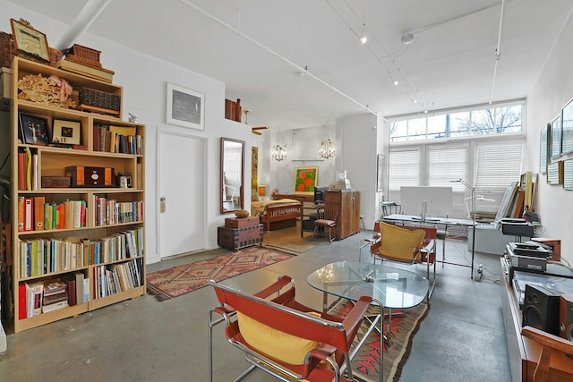 living room featuring concrete flooring