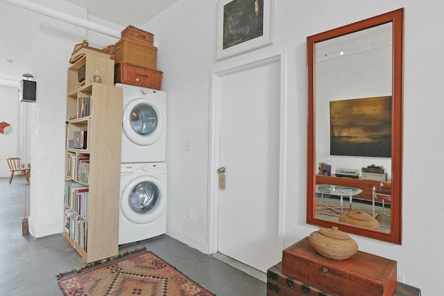 laundry room featuring stacked washer and dryer