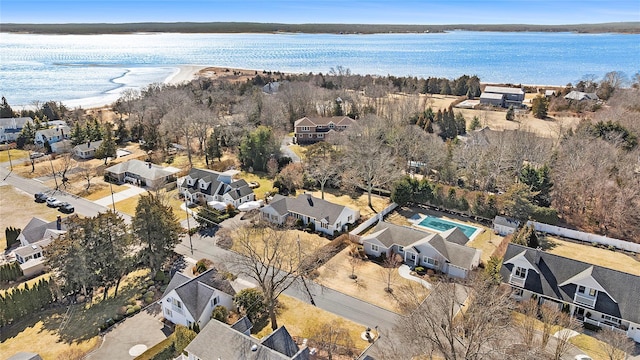 birds eye view of property with a residential view and a water view