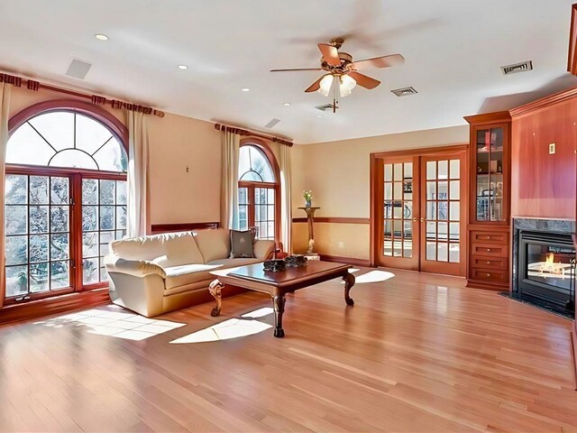 25 Pine Glen Dr, Blauvelt, NY 10913 - living area with ceiling fan, visible vents, and light wood-style floors