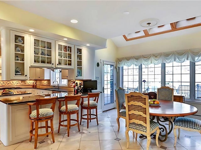 25 Pine Glen Dr, Blauvelt, NY 10913 - dining space featuring vaulted ceiling, recessed lighting, light tile patterned floors, and plenty of natural light
