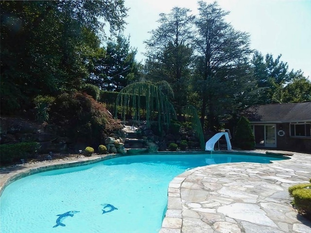 25 Pine Glen Dr, Blauvelt, NY 10913 - outdoor pool featuring a water slide and a patio area