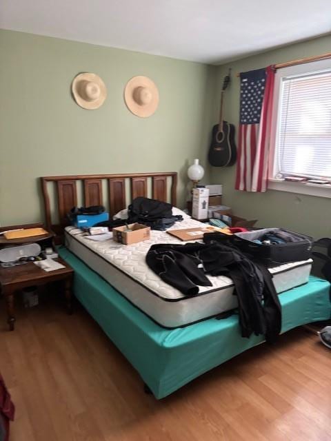 bedroom featuring light wood-style floors