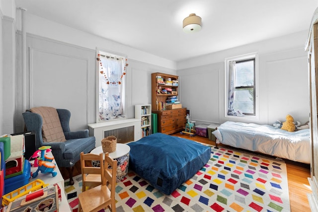 bedroom with light wood-type flooring