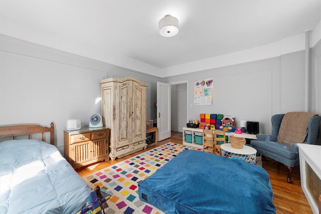 bedroom with light wood-style floors