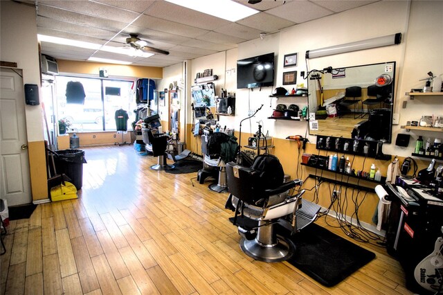 10634 Sutphin Blvd, Jamaica, NY 11435 - workout area with ceiling fan, a paneled ceiling, and wood finished floors
