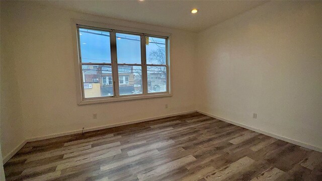 10634 Sutphin Blvd, Jamaica, NY 11435 - spare room featuring recessed lighting, baseboards, and wood finished floors